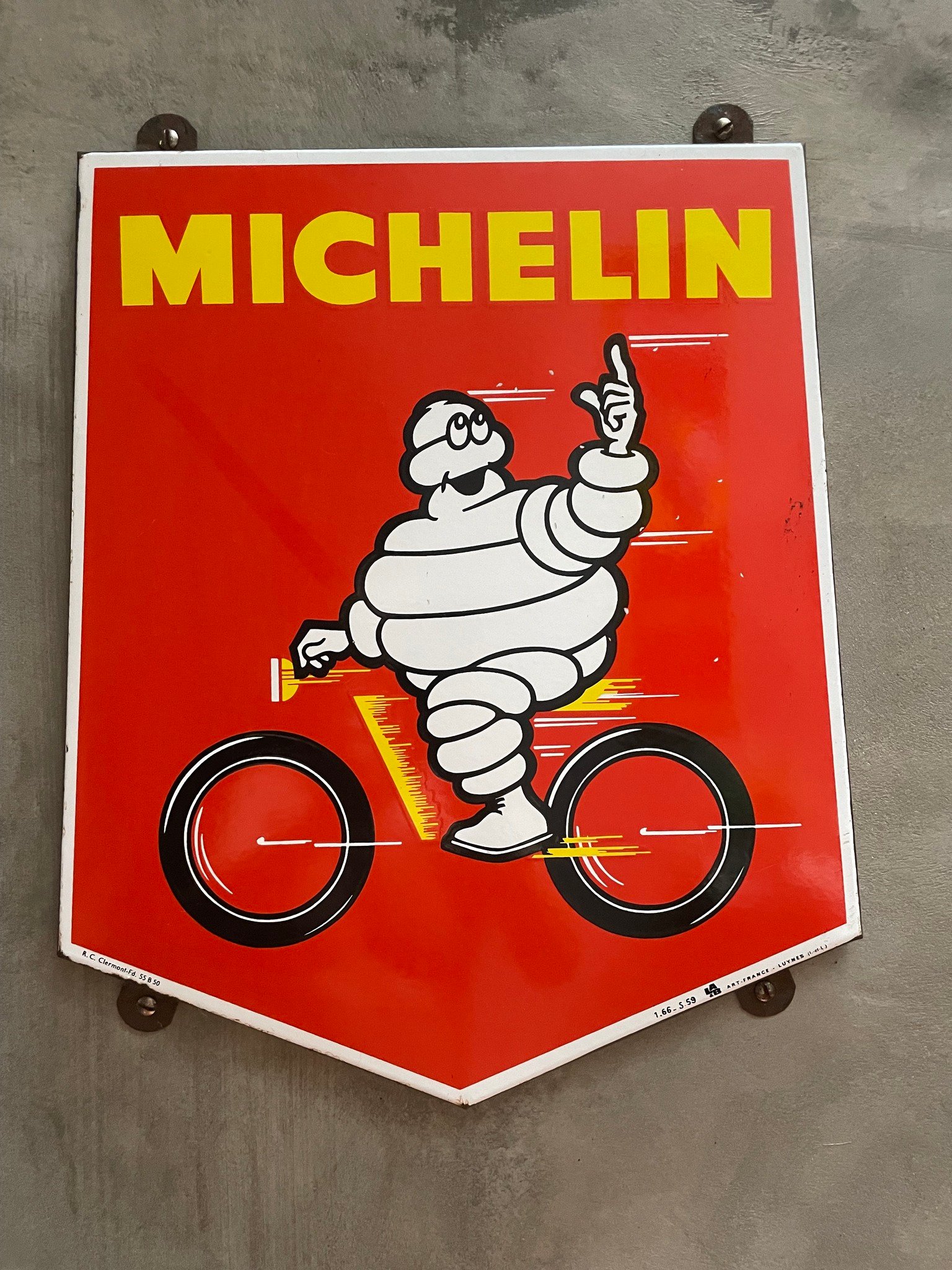 Plaque émaillée Michelin – Bibendum à vélo
